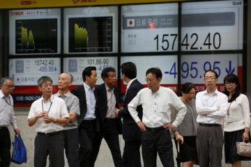 Nikkei falls after Wall Street weakens, strong yen sours mood before BOJ