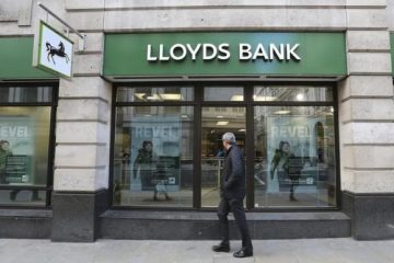Lloyds full-year profit flat as bad loan charge weighs
