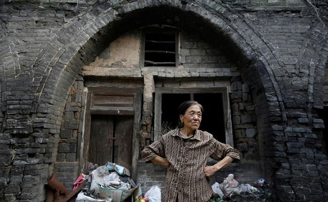 China : Undermining towns sink after mines close