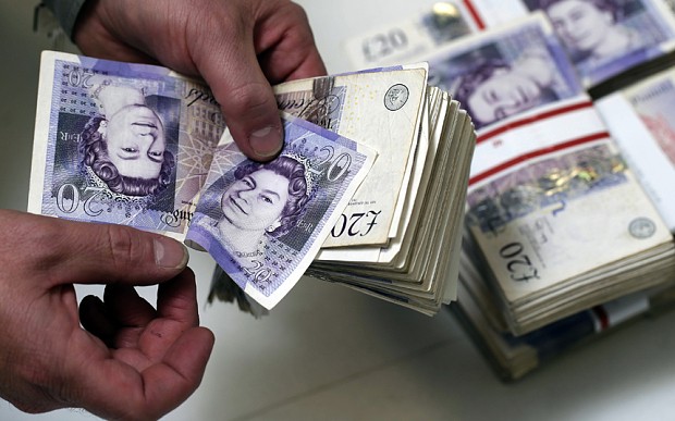 Sterling edges close to one-month lows vs dollar