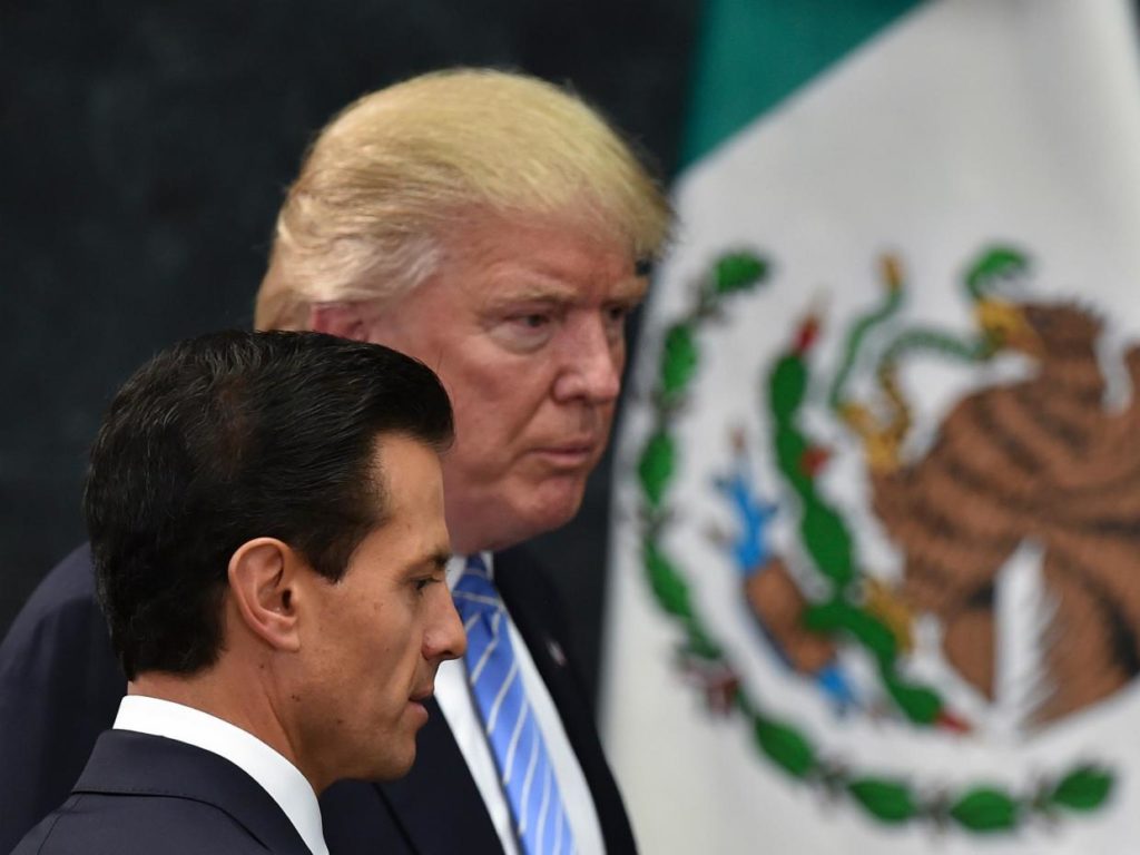 Why is Donald Trump meeting with the Mexican President Enrique Peña Nieto