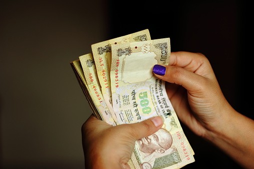 Rupee, bonds slide on Fed stance to a one-week low