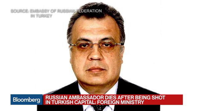 Russian ambassador shot dead in Ankara gallery