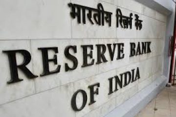 RBI keeps key interest rate unchanged, cuts inflation projections