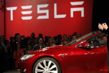 Tesla shares jump to record high ahead of S&P 500 debut