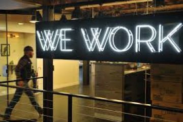 WeWork reports smaller fourth-quarter loss on cost cuts, office space demand