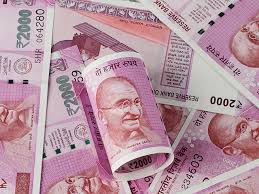 Rupee breaches 69/dollar level; traders await RBI support