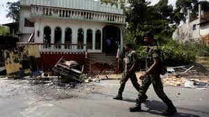 Sri Lanka lifts curfew after bomb attacks kill 290, wound 500