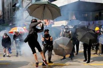 Hong Kong enters recession as protests again erupt in flames