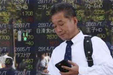 Asian shares edge down as tariff deadline hems bets