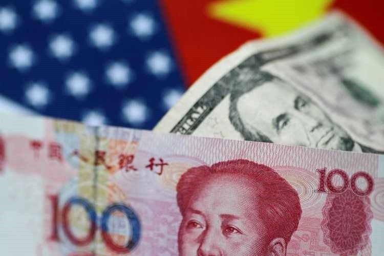 Yuan at 16-month high on upbeat China data, dollar in decline