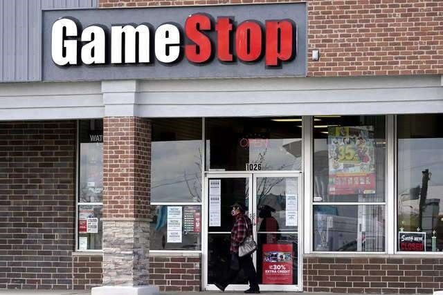 GameStop shares soar on short squeeze, then ease in wild trade session