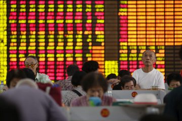 Asian shares rise as Chinese markets return from break