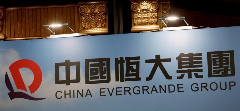 China Evergrande shares, bonds slump as investor worries persist