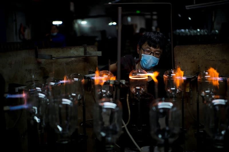 China economy under pressure as factory output, retail sales growth slow sharply