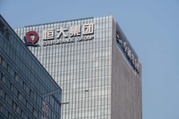 Shares of China Evergrande suspended as chairman under police watch
