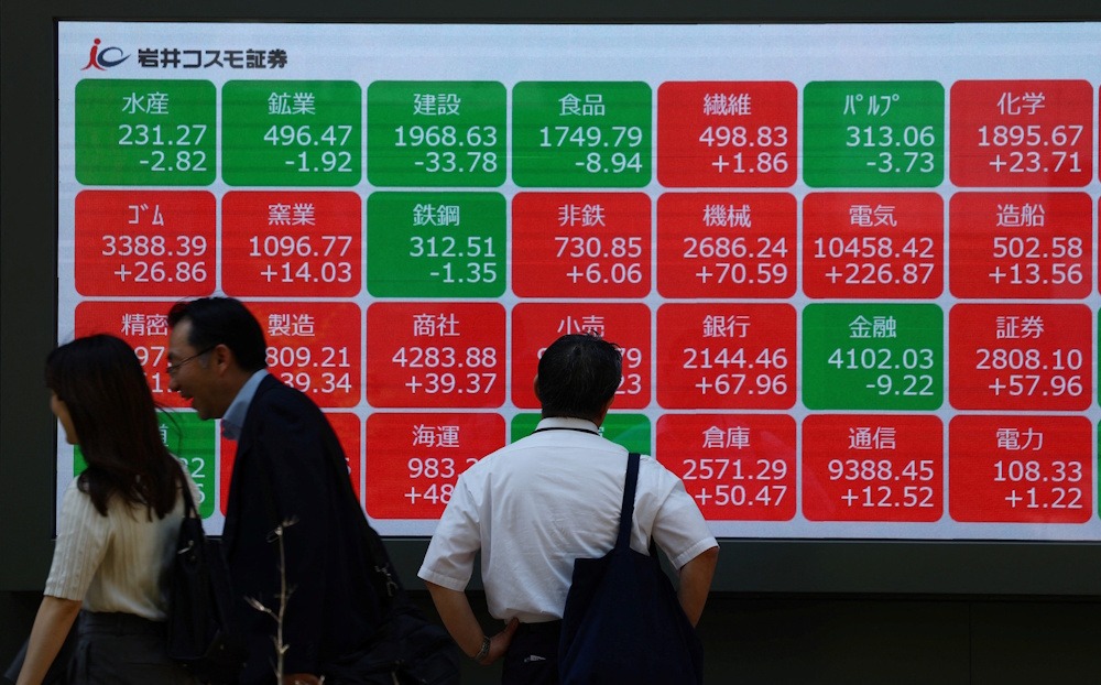Asian stocks solid in harsh November on US rate cut predictions